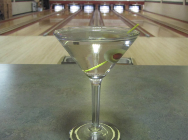 Martini on Counter in Front of Bowling Alley