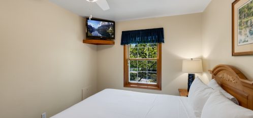 bed with TV mounted